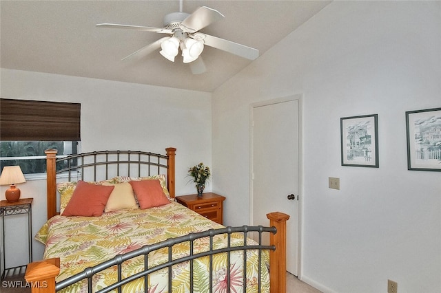 bedroom with vaulted ceiling and ceiling fan