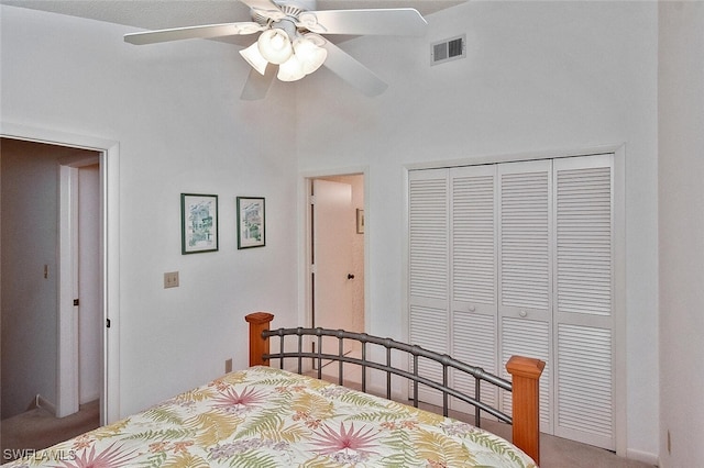 102 Mcgregor Park Cir Unit 102, Fort Myers, FL 33908 - carpeted bedroom featuring a closet, a ceiling fan, and a high ceiling