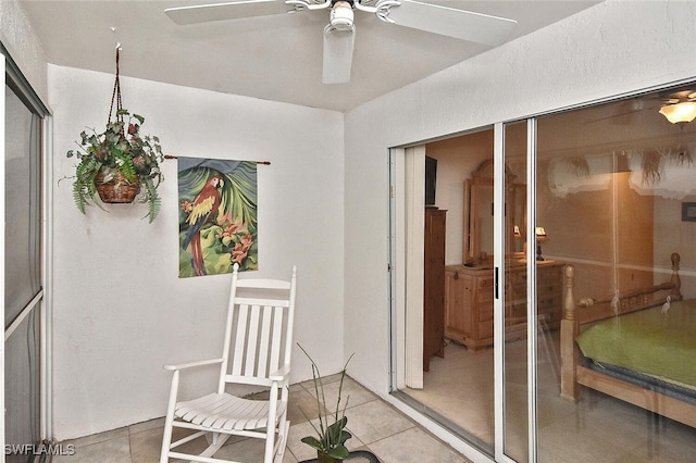 interior space featuring ceiling fan