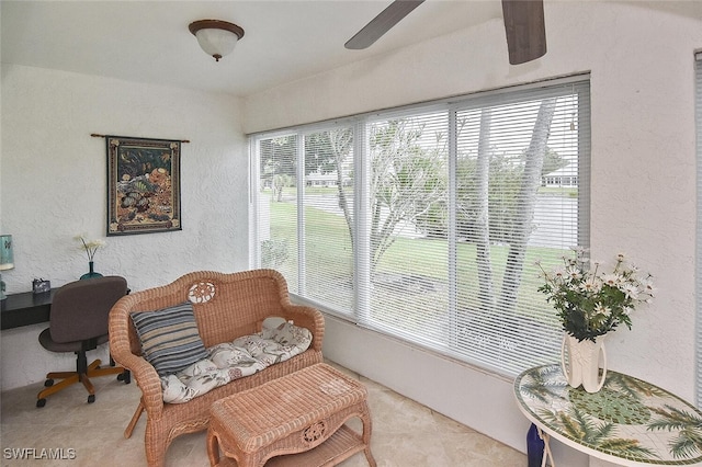 sunroom / solarium with ceiling fan