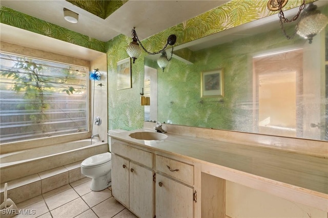 bathroom with vanity, tile patterned floors, and toilet