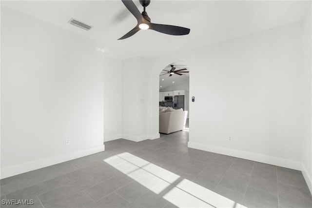 spare room featuring tile patterned floors