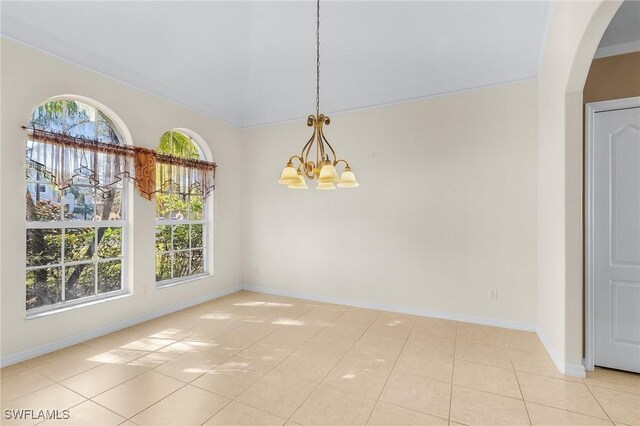 unfurnished dining area with light tile patterned flooring and a notable chandelier