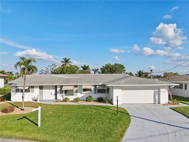 single story home with a front yard and a garage