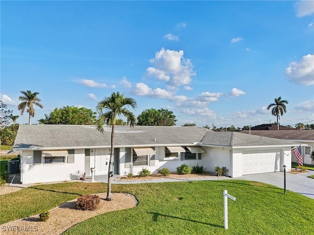 ranch-style house with a garage and a front yard