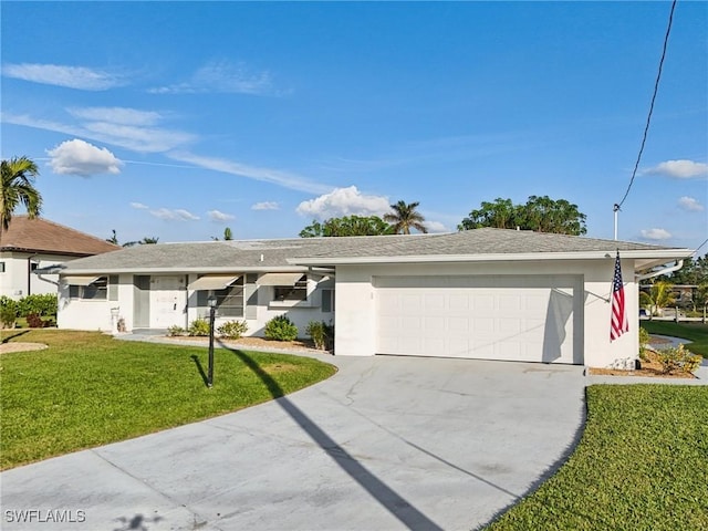 ranch-style house with a garage and a front lawn