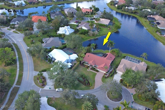 bird's eye view with a water view