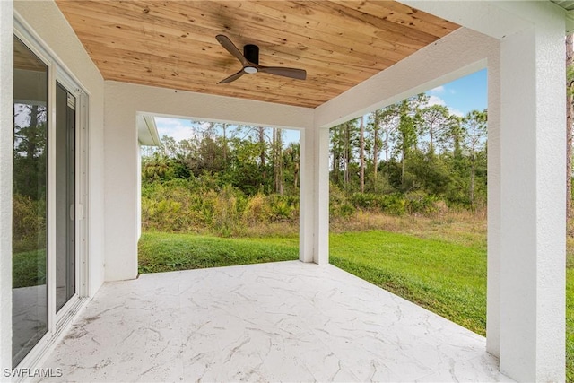 view of patio featuring ceiling fan