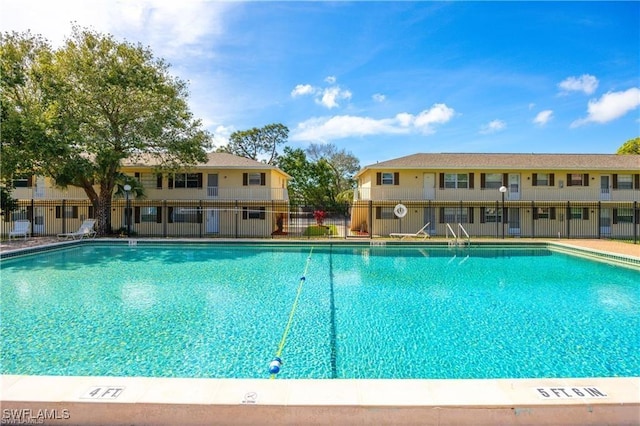 community pool with fence