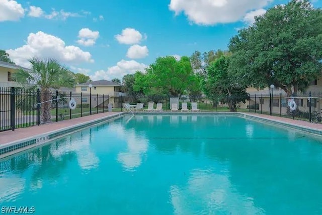 pool featuring fence