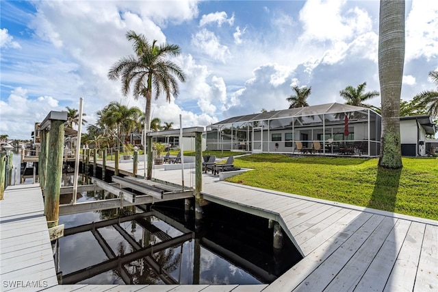 view of dock featuring a yard and a lanai