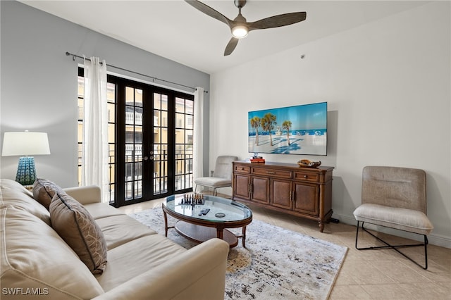 living room featuring ceiling fan, french doors, and light tile patterned flooring