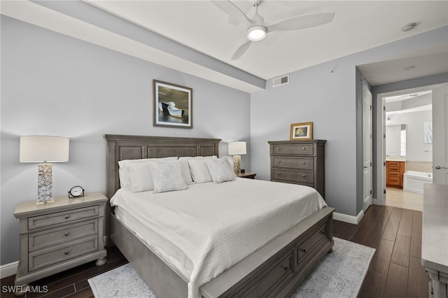 bedroom with ceiling fan and ensuite bath