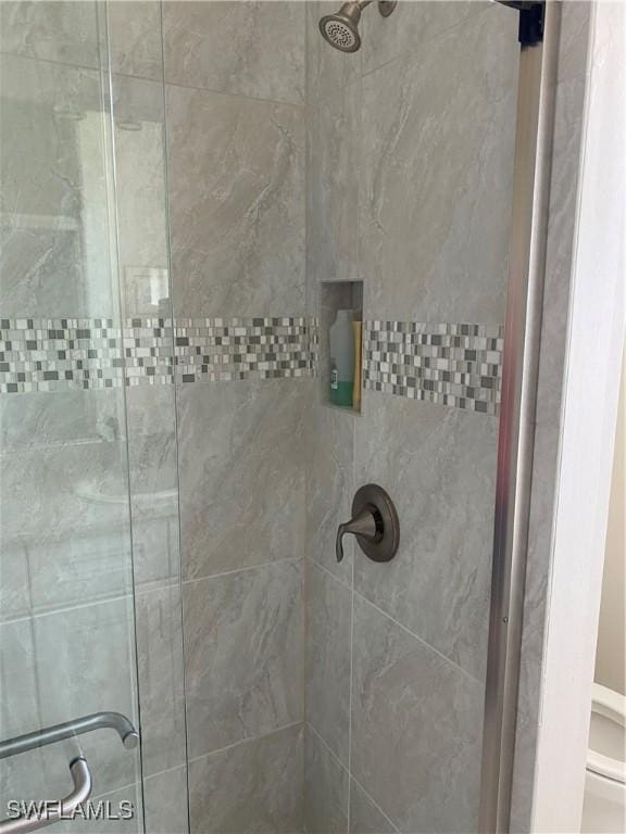 bathroom with an enclosed shower