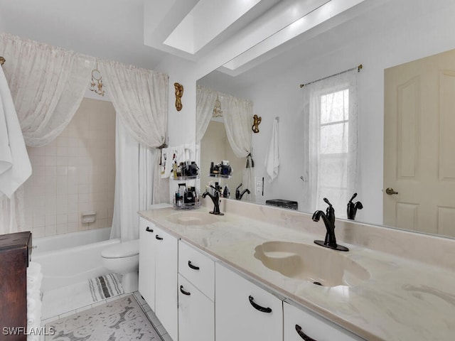 full bathroom featuring tile patterned floors, shower / bath combo with shower curtain, vanity, and toilet