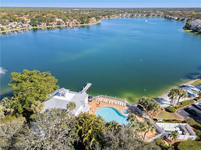 birds eye view of property featuring a water view