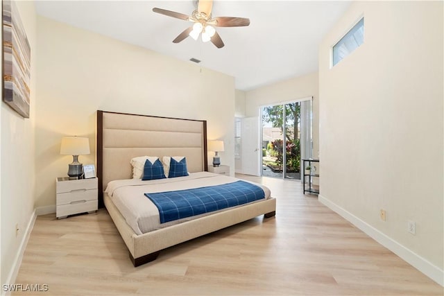 bedroom featuring access to outside, ceiling fan, and light hardwood / wood-style floors