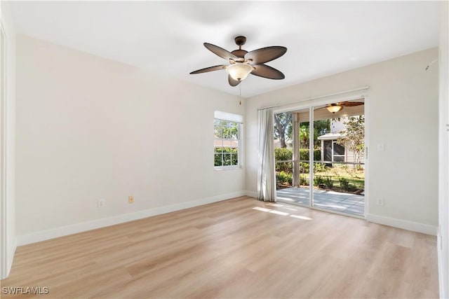 unfurnished room featuring light wood-type flooring and ceiling fan