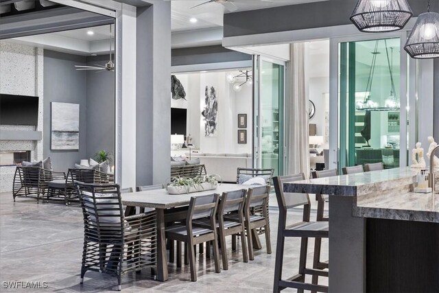 dining room with a large fireplace