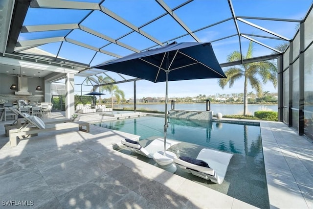 view of swimming pool featuring a patio, a water view, and glass enclosure