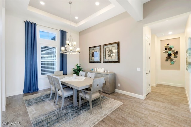 dining area featuring an inviting chandelier