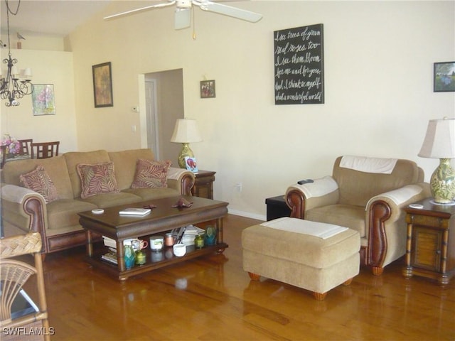 living room featuring ceiling fan and wood-type flooring