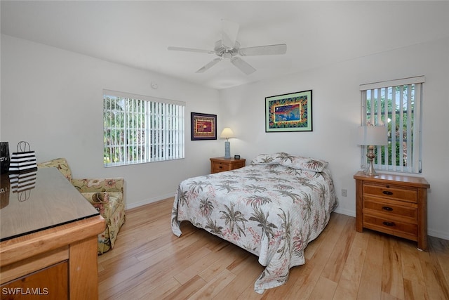 bedroom featuring ceiling fan and light hardwood / wood-style flooring