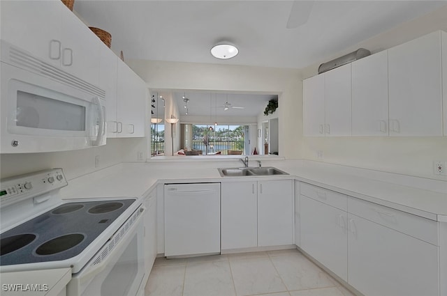 kitchen with white appliances, ceiling fan, sink, white cabinets, and light tile patterned flooring