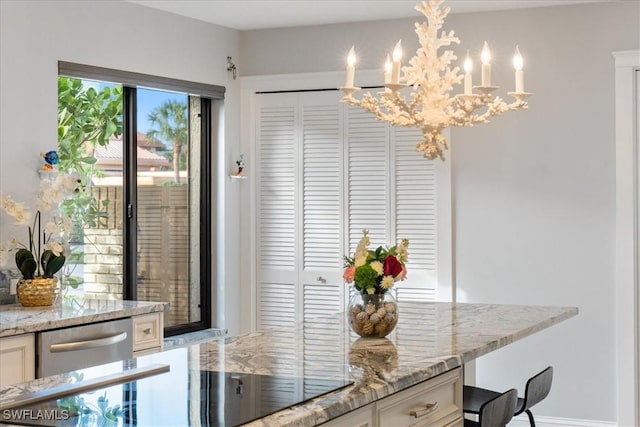 dining space featuring a notable chandelier