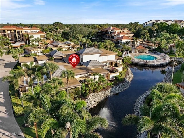 bird's eye view with a water view