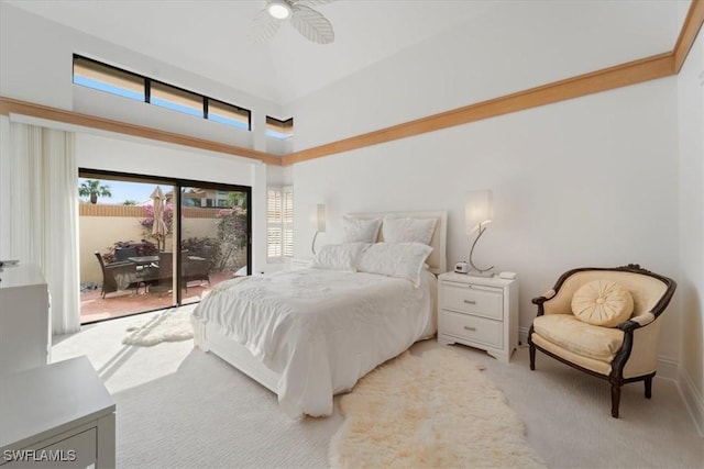 bedroom with access to exterior, a high ceiling, light colored carpet, and ceiling fan