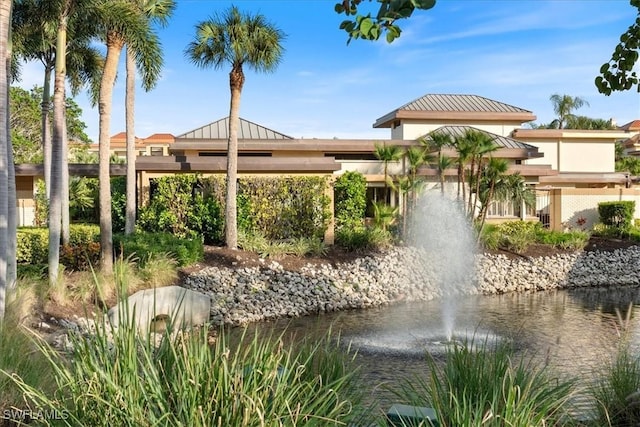 view of property's community with a water view