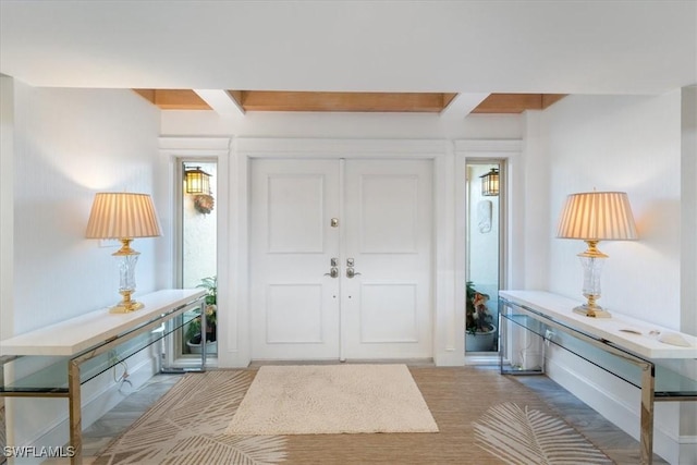 entrance foyer with beamed ceiling