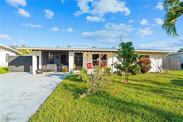 view of front of property with a front yard and covered porch