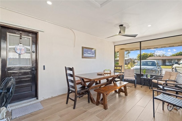 dining room featuring ceiling fan and light hardwood / wood-style floors