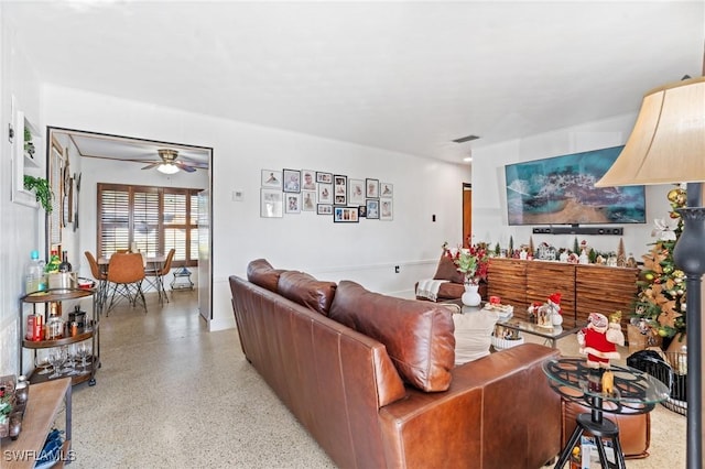 living room with ceiling fan