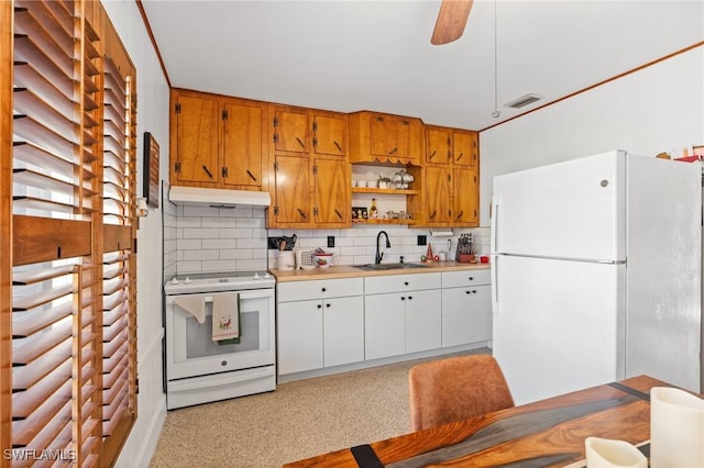 kitchen featuring white cabinetry, sink, ceiling fan, white appliances, and decorative backsplash