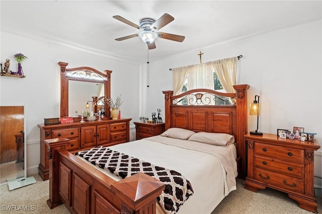 bedroom featuring ceiling fan