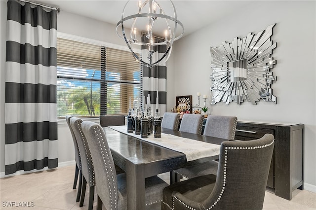 tiled dining area with an inviting chandelier