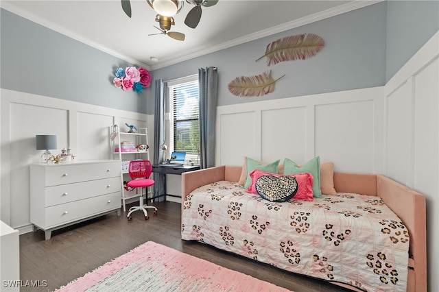 bedroom with ceiling fan, dark hardwood / wood-style floors, and ornamental molding