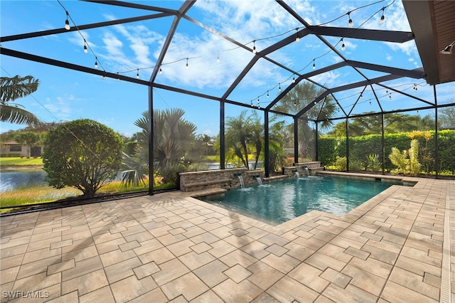 view of swimming pool with pool water feature, a water view, a patio area, and a lanai