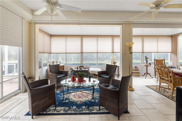 sunroom / solarium with ceiling fan