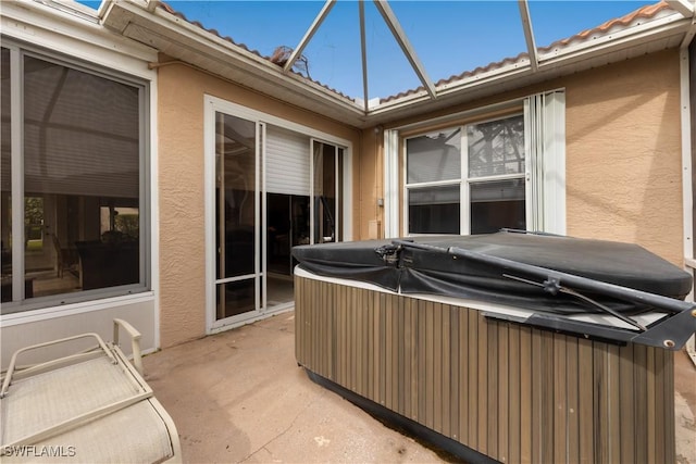 view of patio with a hot tub