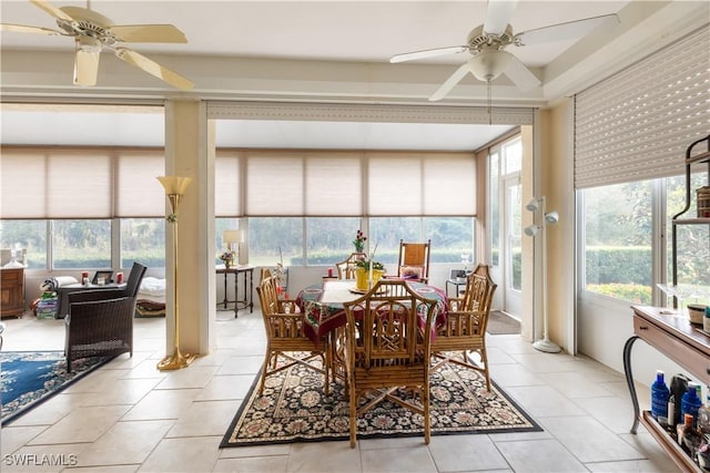 sunroom featuring ceiling fan