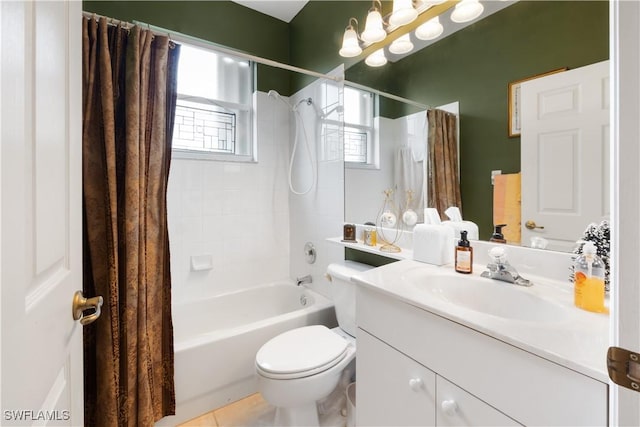 full bathroom with tile patterned flooring, shower / bath combination with curtain, vanity, and toilet