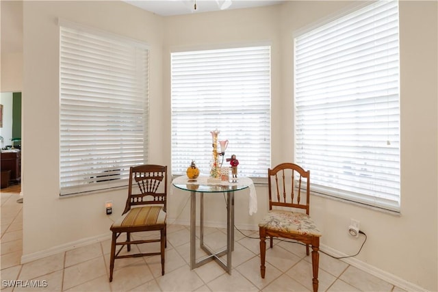 living area with light tile patterned floors