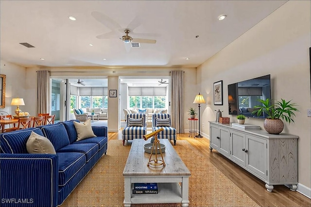 2320 Palo Duro Blvd, North Fort Myers, FL 33917 - living area featuring a ceiling fan, wood finished floors, and recessed lighting