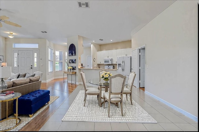 2320 Palo Duro Blvd, North Fort Myers, FL 33917 - dining space with light tile patterned floors and ceiling fan