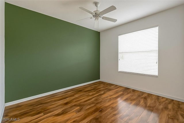 2320 Palo Duro Blvd, North Fort Myers, FL 33917 - unfurnished room featuring wood finished floors and ceiling fan