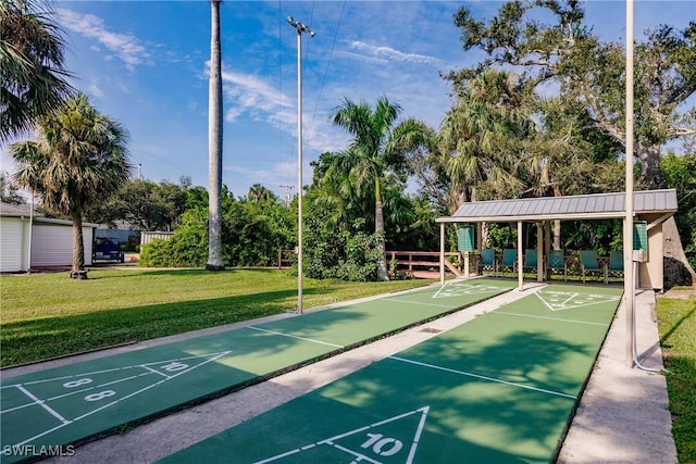 view of home's community featuring a yard